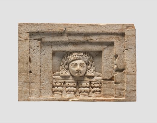 Furniture plaque carved in relief with a “woman at the window”