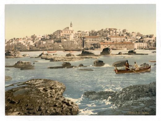 Jaffa (Joppa) seen from the sea, over the rocks of its harbor, c. 1890–1900.